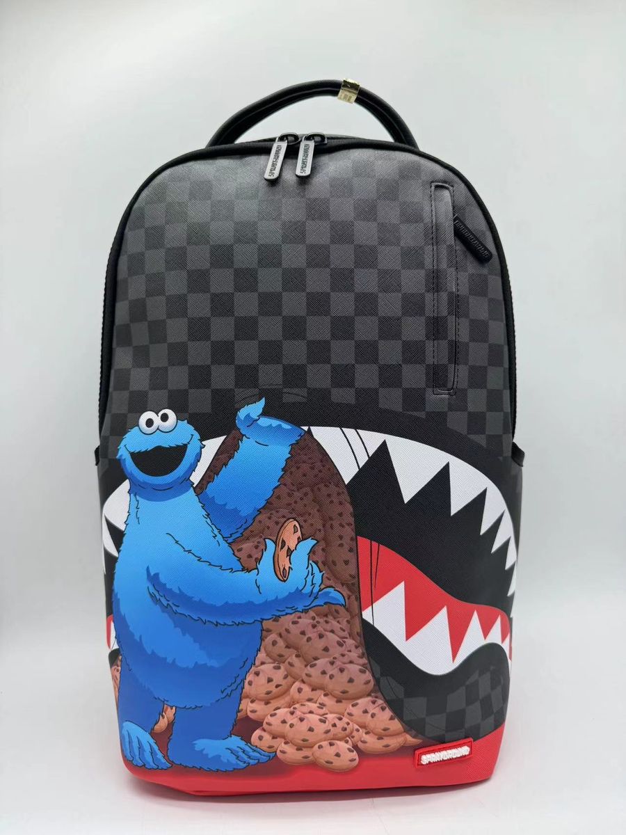 SprayGround SESAME STREET COOKIE MONSTER SNEAKING A BITE DLXSV BACKPACK (B7141)